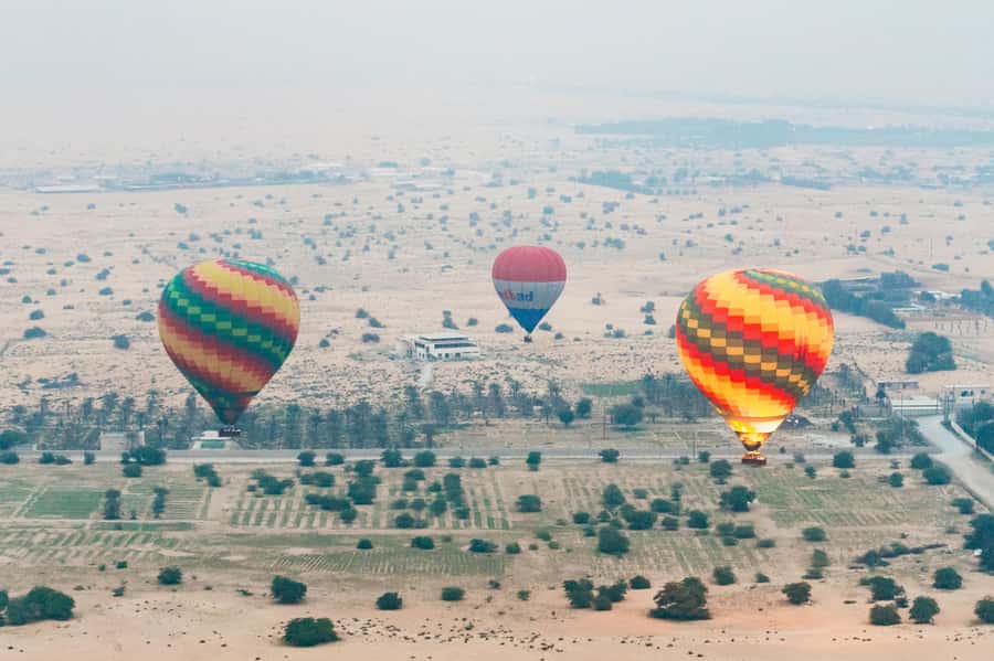Dubai: Sunrise Balloon Flight with Camel Ride & Breakfast - Sunrise over the Dubai Desert Conservation Reserve