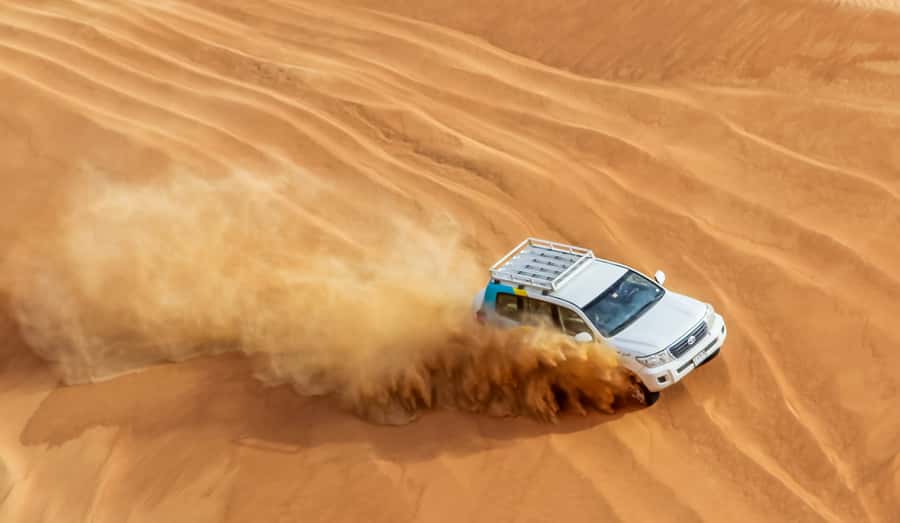 Dubai Sunrise Desert Camel Trek with Breakfast - The 20-minute red-sand dune drive