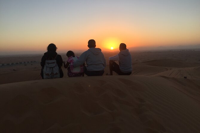 Dubai Sunrise Desert Safari Red Dune Camel Falcon & Sandboarding - Dune bashing across the red sand