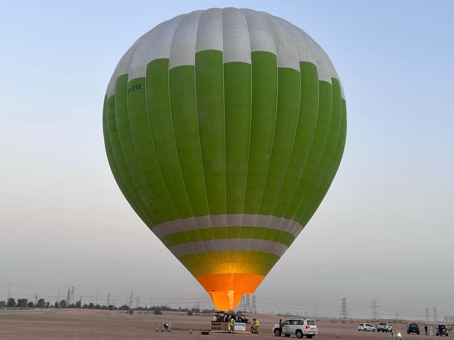 Dubai: Sunrise Hot Air Balloon Ride with Transfers - Landing, refreshments, and the flight certificate
