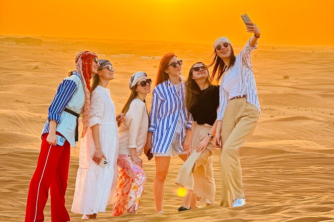 Dubai Sunset Red Dune Desert Safari, Sandboarding and Camel Ride - Hotel Pickup Starts the Evening