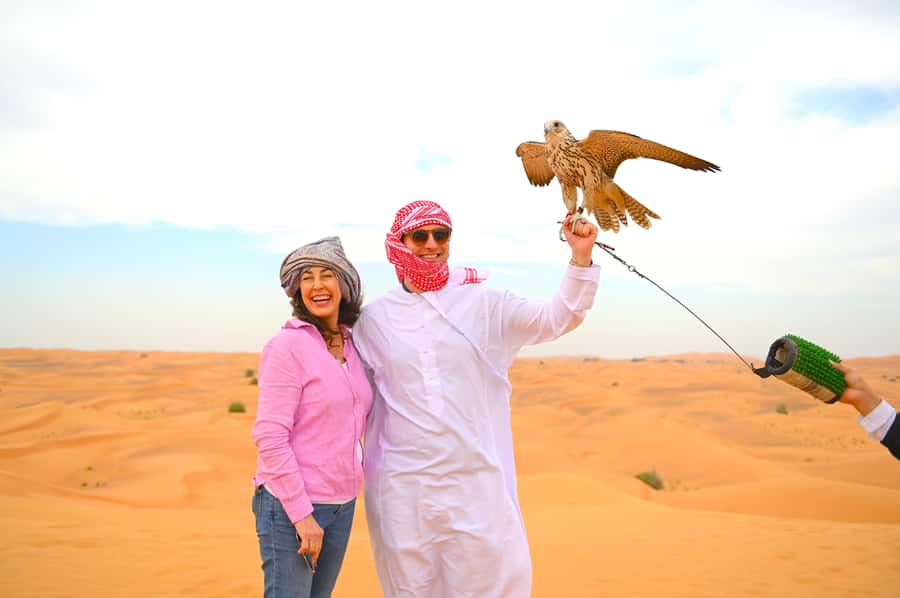 Dubai: Tour with BBQ Dinner, Camel Ride, & Traditional Show - Welcome sweets, henna, and Arabic coffee