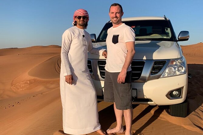 Dubai: Unique SUNSET 4WD Red Dunes Safari - Sandboarding is simple, included, and worth trying