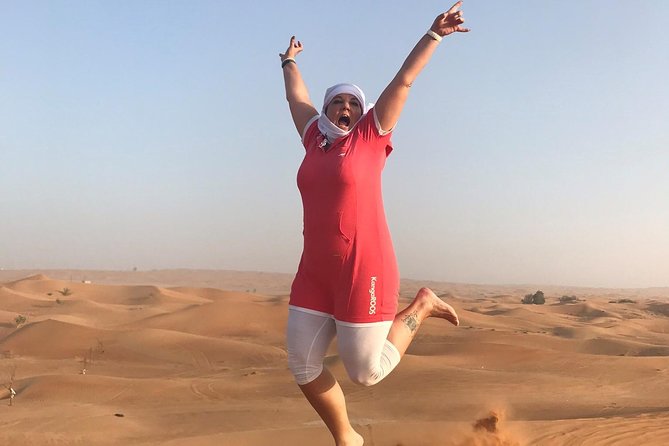 Dubai: Unique SUNSET 4WD Red Dunes Safari - The camel ride is brief but adds cultural context