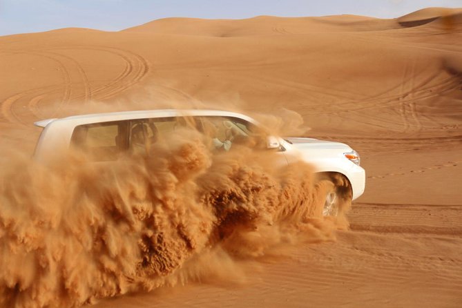 Dubai: Unique SUNSET 4WD Red Dunes Safari - Henna, shisha, and shows round out the evening