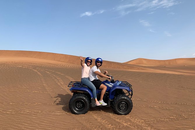 Dubai: Unique SUNSET Quad Bike Red Dunes Safari - Sunset on the tallest dunes