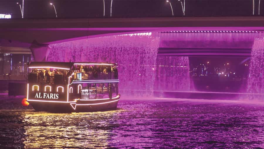 Dubai: Water Canal Cruise and La Perle Show with Dinner - A dhow with two ways to enjoy dinner