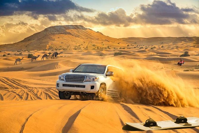 Dubai4x4 Evening Desert Safari,Camel Ride,4 Live Shows,BBQ Dinner - Dune bashing for 30 to 40 minutes
