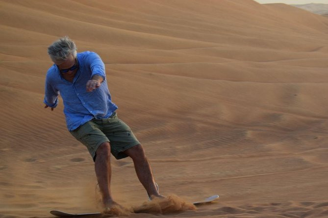 Dune Bashing with Quad Bike and Sand Boarding from Dubai - Thirty minutes over the rolling dunes