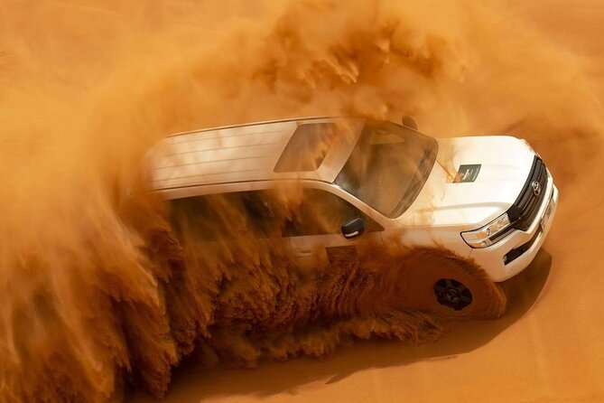 Evening Desert Safari Dubai BBQ Dinner Dune Bashing Dune Buggy - Leaving Dubai Behind in a 4x4