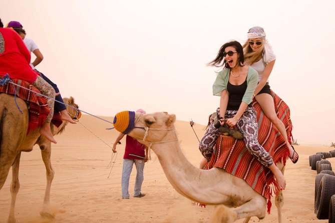 Evening Desert Safari Dubai with Belly Dance - Red dunes, sharp turns, and sunset