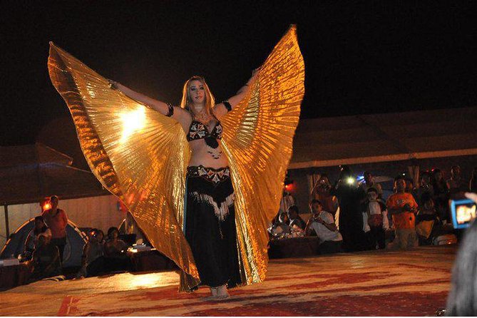 Evening Desert Safari Dubai with Belly Dance - Sandboarding and a short camel ride
