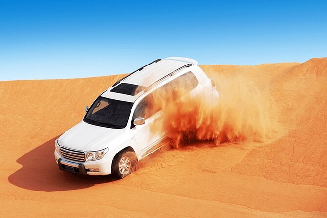 Evening Desert safari Dubai With Quad Bike Ride & BBQ dinner - Quad bikes, dune buggies, and sandboarding