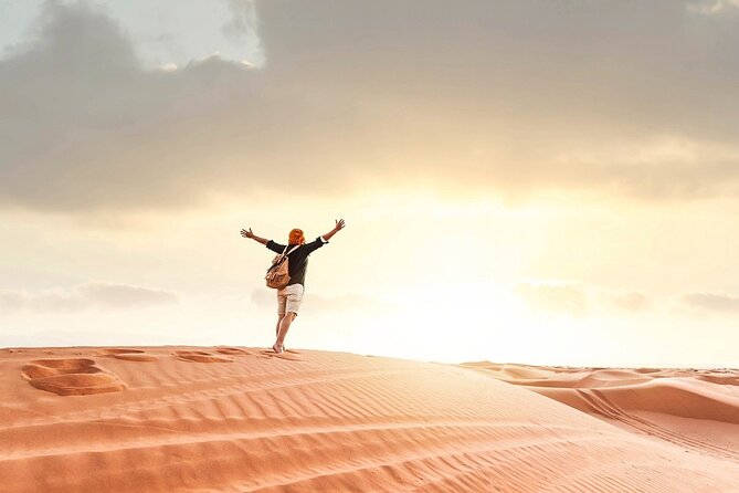 Evening Desert Safari in Dubai - Sandboarding and Sand Skiing on the Dunes