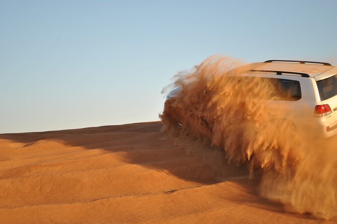 Evening Desert Safari Tour with Sand Surfing, BBQ Dinner (Exclusive Car) - Leaving Dubai in a private 4x4