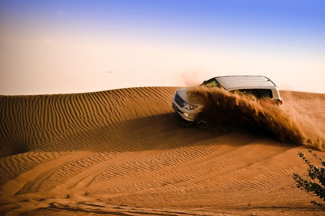 Evening Desert Safari Tour with Sand Surfing, BBQ Dinner (Exclusive Car) - The tire-pressure stop and optional quad bikes