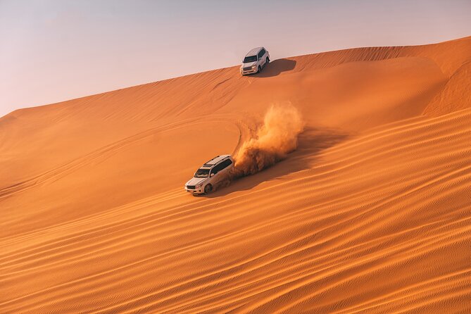 Evening Desert Safari with ATV Quad Bike Dune Bashing BBQ Dinner - Camel riding and a short taste of desert tradition