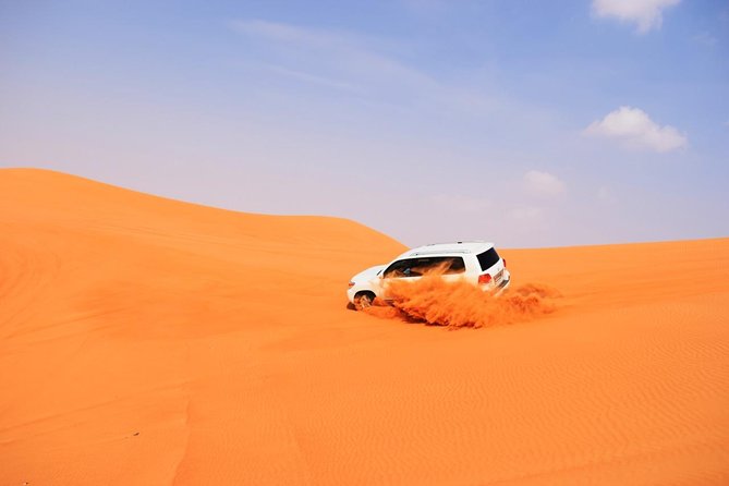 Evening Desert Safari with BBQ Dinner - Belly dancing, tanoura, and fire after dinner