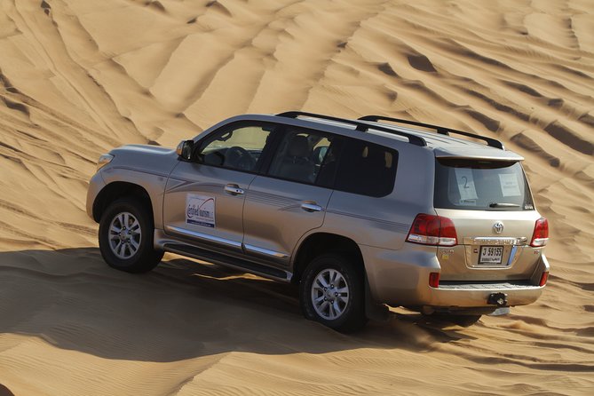 Evening Desert Safari with Bbq Dinner and Entertainment - Fire, belly dancing, and tanoura after dark
