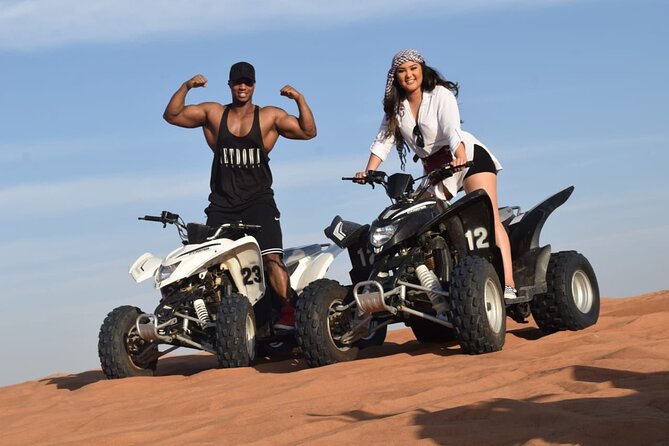 Evening Desert Safari with BBQ Dinner and Live Shows - Dune bashing, sandboarding, and the sunset stop