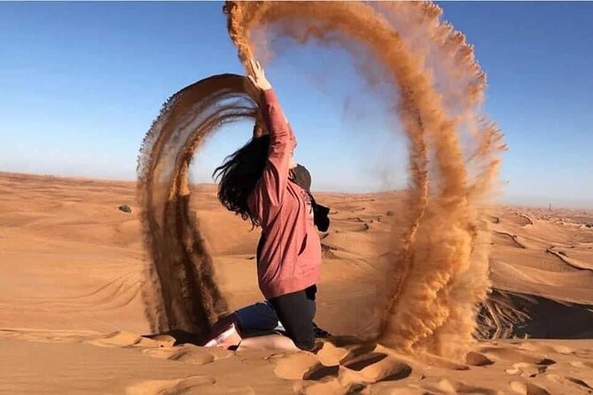 Evening Desert Safari with BBQ Dinner and Live Shows - Tanura, belly dancing, and fire performances