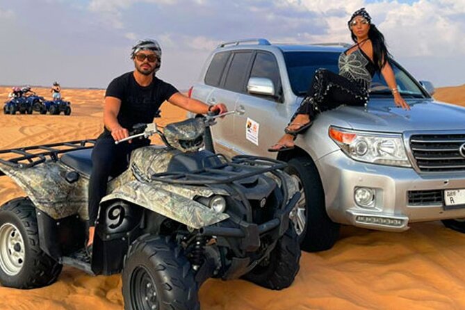 Evening desert safari with camel ride and BBQ dinner - Sandboarding, sunset photos, and the optional quad bike