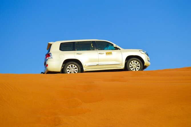 Evening Desert Safari with Quad Bike, BBQ Dinner and Camel Ride - Forty-five minutes of red-dune bashing