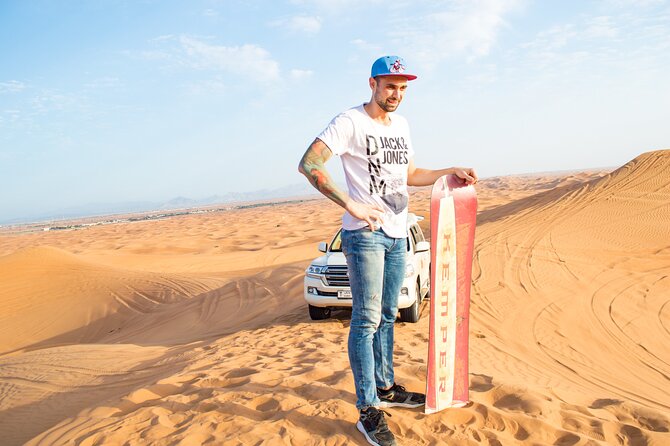 Evening Desert Safari with Quad Bike, BBQ Dinner and Camel Ride - Sunset gives way to a traditional camp