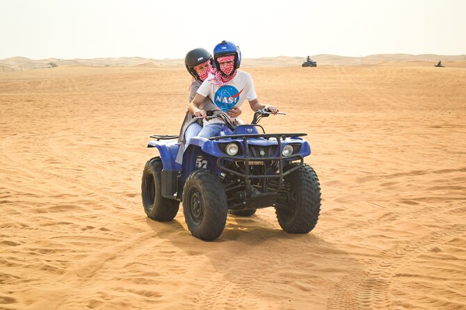 Evening Desert Safari with Quad Bike, BBQ Dinner and Camel Ride - BBQ dinner with seven different performances
