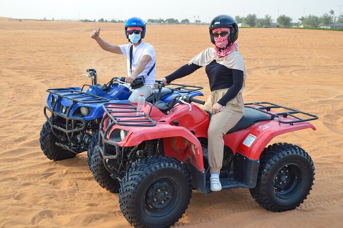 Evening Desert Safari with Quad Bike, BBQ Dinner and Camel Ride - Quad biking across the Lahbab desert