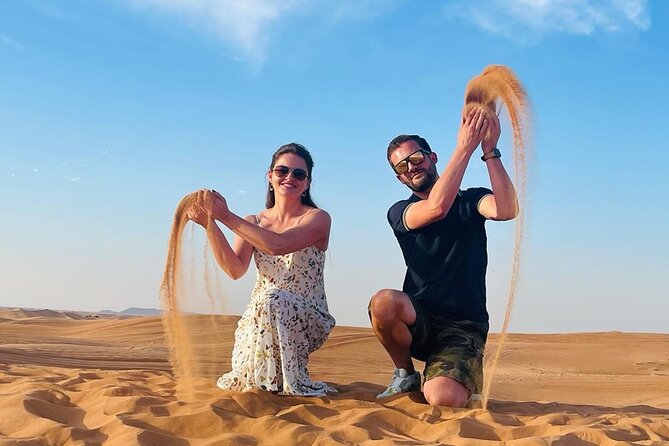 Evening Desert Safari with Quad Bike, Camel Ride & BBQ Dinner - From Dubai hotel pickup to the open desert
