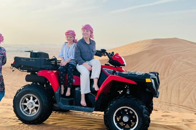 Evening Desert Safari with Quad Bike, Camel Ride & BBQ Dinner - Dune bashing and the changing desert light