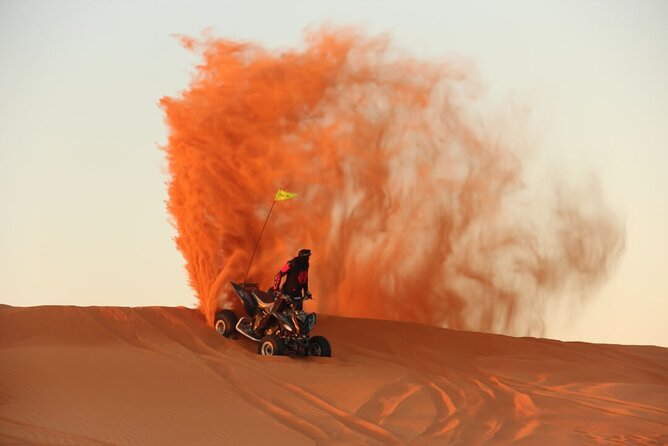Evening Desert Safari with Quad Bike, Camel Ride & BBQ Dinner - ATV riding across the red dunes