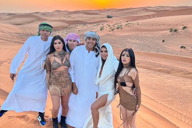 Evening Dubai Safari with BBQ, Dance Shows & Quad Biking optional - Sandboarding is simple, fun, and brief