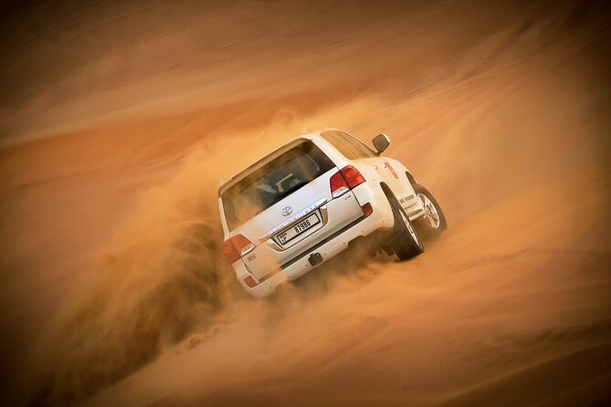 Evening Quad Bike, Desert Safari in Dubai , BBQ Dinner and Shows - Red-dune dune bashing with an experienced driver