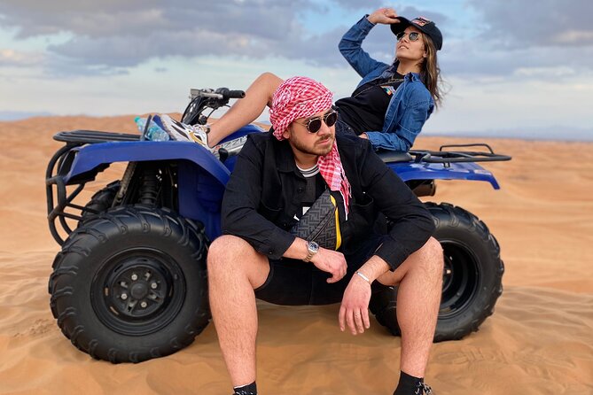 Evening Quad Bike, Desert Safari in Dubai , BBQ Dinner and Shows - Sand boarding, camel riding, and desert photos