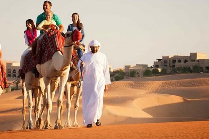 Evening Red Dune Desert Safari in Dubai with BBQ Dinner - Sandboarding and camel riding