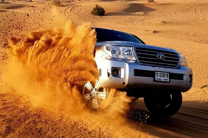 Evening Red Dunes Desert Safari: BBQ Dinner & Adventure Awaits! - Key points at a glance