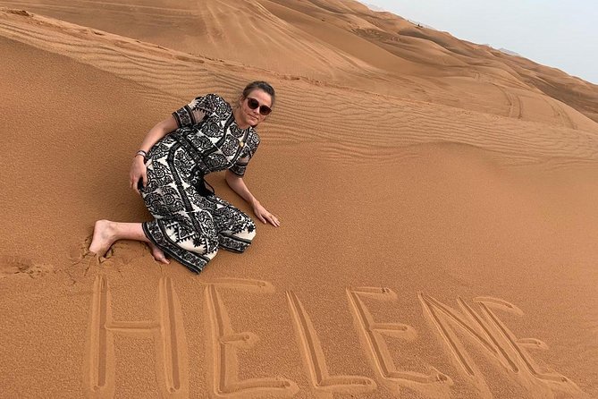 Evening Red Dunes Desert Safari Private Only Dune Bashing - A 10-minute camel ride, short but worthwhile