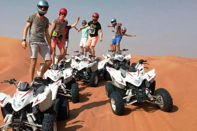 Evening Safari with Dune Bashing, BBQ Dinner and Belly Dance - Camel riding, sandboarding, and desert photos