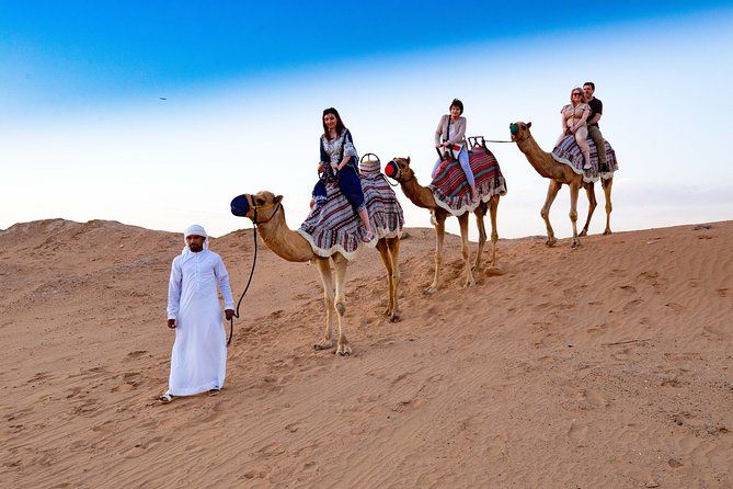 Exclusive private vehicle, front table, food served by Buttler - Sunset photos, camel riding, and sandboarding
