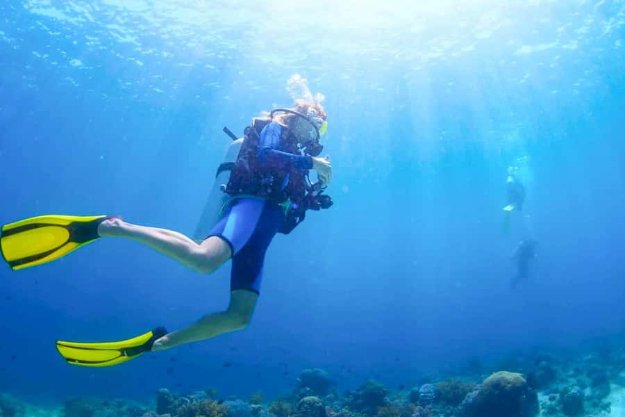 From Dubai: Fujairah Scuba Dive and Snorkeling - Boarding the boat with Oman Gulf views
