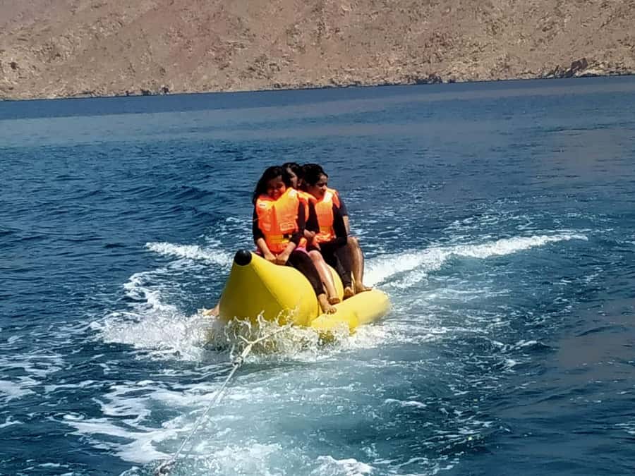From Dubai/Sharjah/RAK: Dibba Musandam Trip & Dhow Cruise - Swimming, kayaking, snorkeling, and banana boats