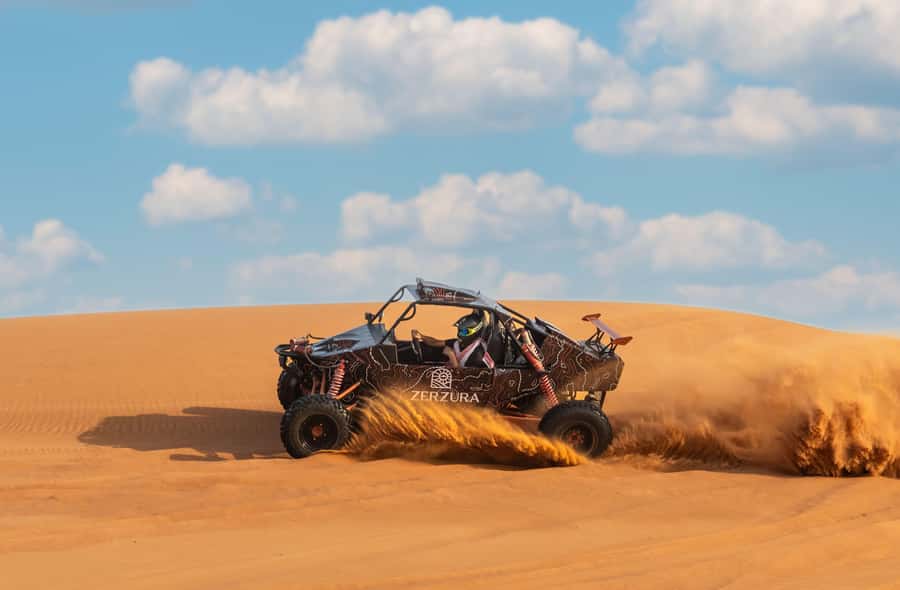 From Dubai: Zerzura Dune Buggy Experience & Fossil Discovery - Sandboarding at Camel Rock