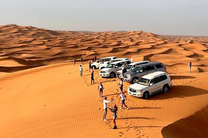 Full-Day Dubai Desert Safari Tour - Reaching the red dunes near Al Madam