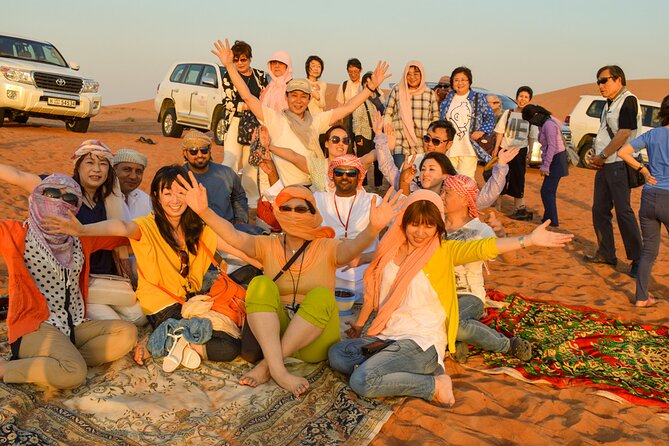 Full-Day Guided Red Dunes Desert Tour in Dubai with Camel Ride - Forty-five minutes of dune bashing and sandboarding