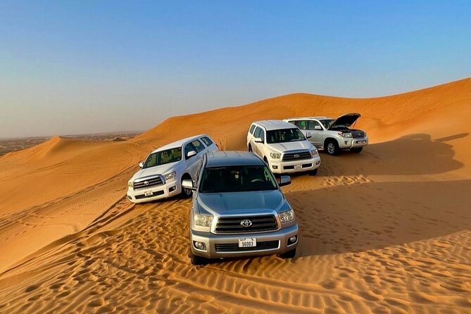 Guided Desert Safari with Dinner and Quad Biking in Dubai - Camel riding and sandboarding without the rush