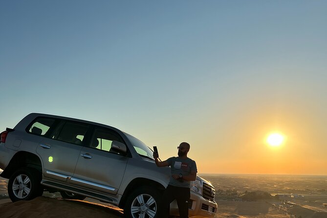 Half Day Desert Experience Camel Dune BBQ ATV option - Sandboarding with time for photographs