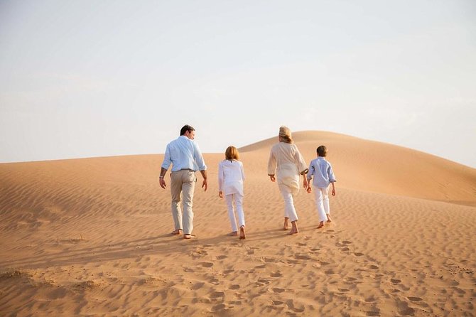 Half-Day Dubai Desert Safari With 7 Live Shows and BBQ Dinner - Arriving at the Bedouin-style camp