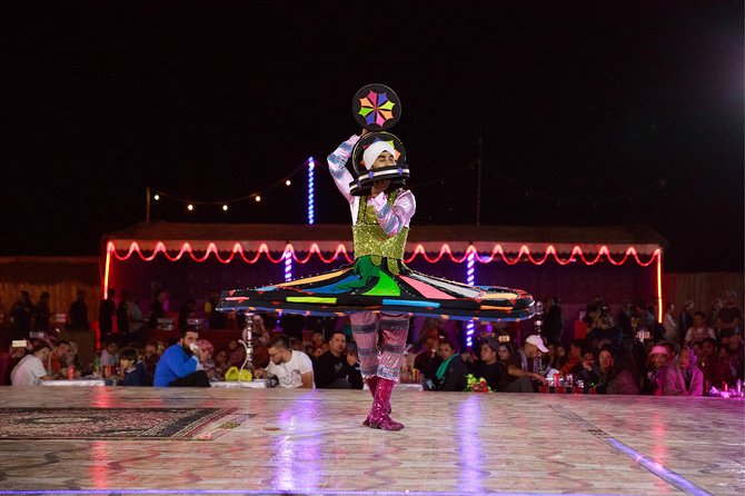 Half-Day Evening Desert Safari in Dubai with BBQ Dinner - Tanura, belly dancing, and fire performances
